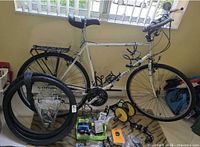 Full view of bicycle with accessories laid out
