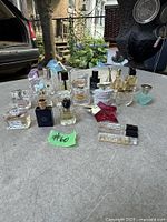 All perfume miniatures and vials on tabletop
