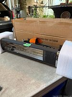 Heater in foam packaging next to original box