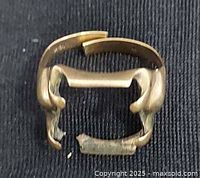 Broken 10K gold men’s ring band showing fractured shank and empty mount