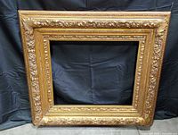 Front view of entire ornate gold frame