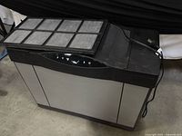 Front and top view showing filter panel and control panel