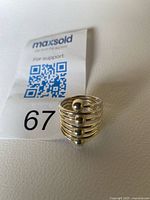 Front view of sterling silver multi-row band ring with bead accents