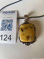 Front view showing jasper stone and ornate bezel