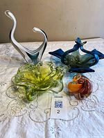 All four art glass pieces on table