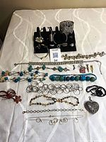 Overall view of all costume jewelry pieces laid out on table