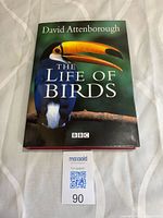 Front cover showing title, author, toucan image and dust jacket