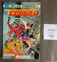 Front cover showing title, artwork, price 25¢, Atlas Comics logo