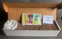 Cardboard storage box filled with 1978 Topps cards, small sample stack visible on top