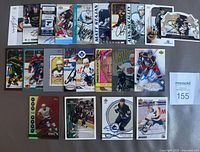 Full layout of 25 signed hockey cards