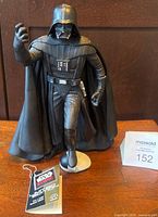 Front view of Darth Vader figure with tag and base