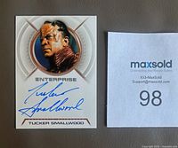 Front of signed Tucker Smallwood autograph card and MaxSold lot number
