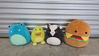 Group shot of all four Squishmallows plush toys