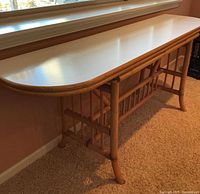 Console configuration of bamboo table under window