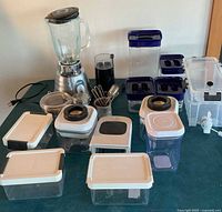 Group shot of blender, coffee grinder, and assorted storage containers