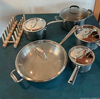 Group shot of all pans, lids and rack