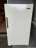 Front view of Frigidaire upright freezer closed