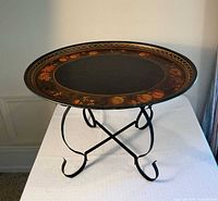 Tray table assembled showing painted top and stand