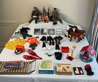 Overall lot layout on table showing all items