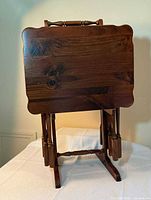 full view of tray tables stacked in rack