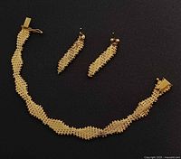 Full set showing bracelet and earrings