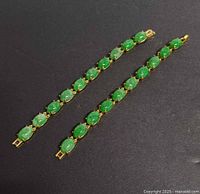 Two straight bracelets showing all cabochons and clasps