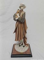 Front view of Armani figurine showing full details