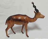 Side view of full leather antelope showing body color and horn detail