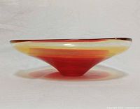 Side profile showing flared shallow form and color layering