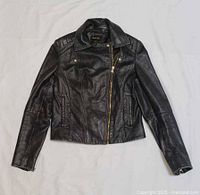 Front view of black leather biker jacket
