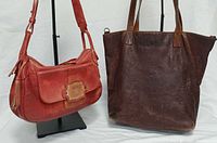 Red Radley bag and brown Stone Ridge tote side by side