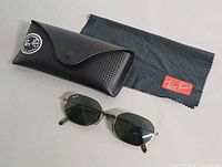 Sunglasses with case and cloth displayed