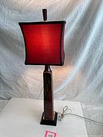 Full view of lamp with shade lit