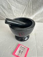 Mortar and pestle side view on table