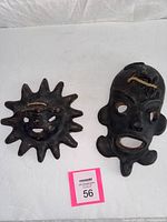 Front view of both matte black ceramic masks