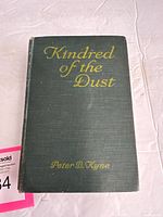 Front cover showing title and author on green cloth
