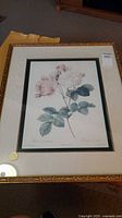 Front view of framed Rosa Damascena print showing image, matting, and frame