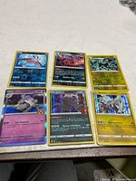 All six Pokémon cards laid out in two rows