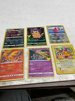 All six cards laid out in two rows