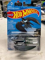 Front view of sealed Hot Wheels Batplane blister card showing vehicle and card details