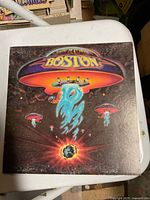 Front jacket showing Boston spaceship artwork