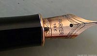Close view of 18K gold nib showing Parker branding and hallmark
