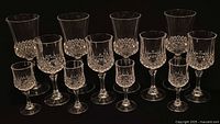 All 12 Longchamp crystal stemware pieces grouped by size