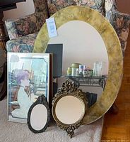All four mirrors grouped together showing sizes and frames