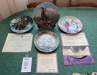 overview of four plates with three certificates