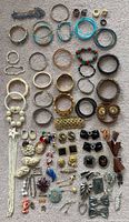 Full layout of bangles, brooches, pins and rings