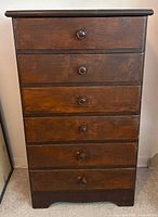 Front view of six-drawer chest