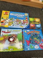 Front view of all four game boxes
