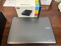 Closed Acer Chromebook and WD Elements box on table