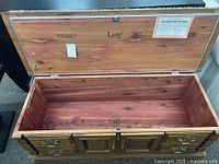 Open Lane cedar chest showing cedar interior and maker marks